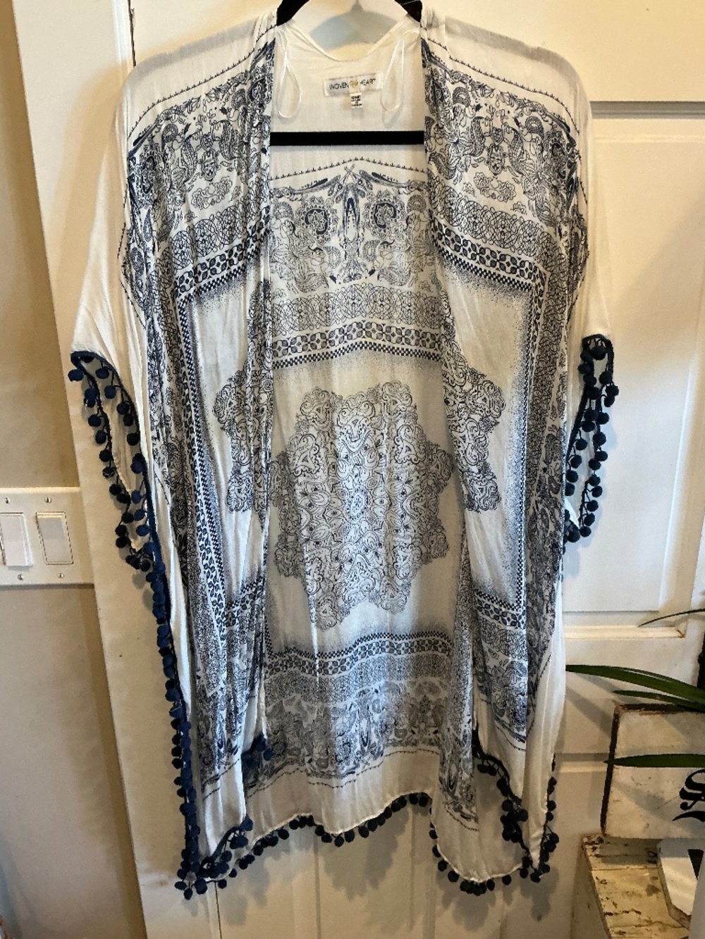 Woven Heart light weight kimono. With cool pompom edges!One size fits most!